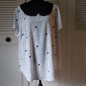 Black stars and white blouse.